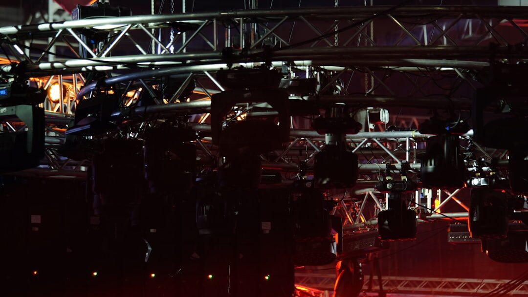 Modern television news studio set with cameras and lighting rigs