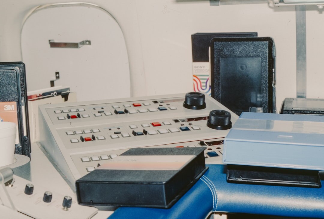 Broadcast control room with multiple video monitors and switching equipment